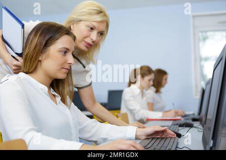 student with a laptop Stock Photo