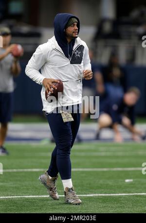 Dallas Cowboys' Dak Prescott (4) wears a cap styled with the Salute To  Service campaign logo as he warms up before an NFL football game against  the Kansas City Chiefs on Sunday, Nov. 5, 2017, in Arlington, Texas. (AP  Photo/Brandon Wade Stock Photo
