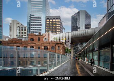 Elevated walkway from Wynyard Station to Barangaroo amidst modern skyscappers in Sydney, Australia on 6 January 2023 Stock Photo