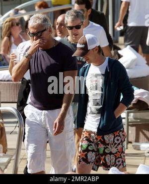 Harry Potter baddie, Tom Felton, emerges on New Years Day to enjoy a rooftop lunch with his girlfriend Jade Olivia and his family. Miami Beach, FL. 1/1/11/     . Stock Photo