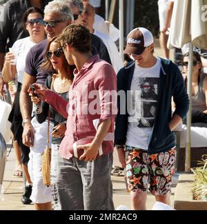 Harry Potter baddie, Tom Felton, emerges on New Years Day to enjoy a rooftop lunch with his girlfriend Jade Olivia and his family. Miami Beach, FL. 1/1/11/ Stock Photo