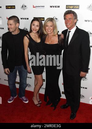 John Easterling, Olivia Newton-John, her daughter Chloe Lattanzi and musician Crosby Loggins pose for photographers at 'G'Day USA 2011' Black Tie Gala held at Hollywood Palladium, celebrating Australia Week and 'promoting all things Australian, across the United States including business, innovation, film, music, culture and the environment'. Los Angeles, CA. 01/22/11. Stock Photo