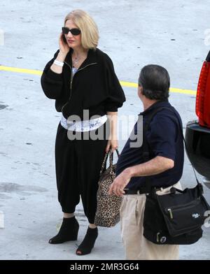 Lady Gaga's parents Cynthia and Joseph Germanotta arrive at Lady Gaga's concert at the American Airlines Arena in Miami, FL. 4/13/11. Stock Photo