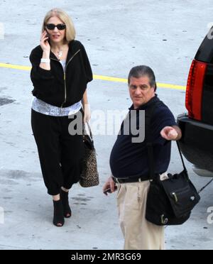 Lady Gaga's parents Cynthia and Joseph Germanotta arrive at Lady Gaga's concert at the American Airlines Arena in Miami, FL. 4/13/11. Stock Photo