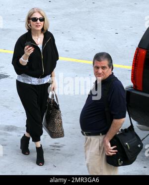 Lady Gaga's parents Cynthia and Joseph Germanotta arrive at Lady Gaga's concert at the American Airlines Arena in Miami, FL. 4/13/11. Stock Photo