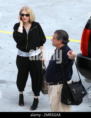 Lady Gaga's parents Cynthia and Joseph Germanotta arrive at Lady Gaga's concert at the American Airlines Arena in Miami, FL. 4/13/11. Stock Photo