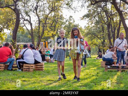 Kyiv, Ukraine - September 11, 2021: People visit Kartuli Fest Georgian Wine Party in National Exhibition Center. Stock Photo