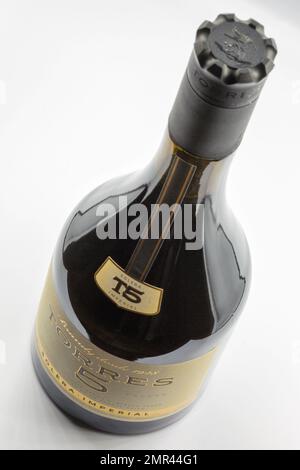 Kyiv, Ukraine - November 27, 2021: Studio shoot of brandy bottle Torres 5 closeup against white. Manufacturer Miguel Torres S. A. Spain. Stock Photo
