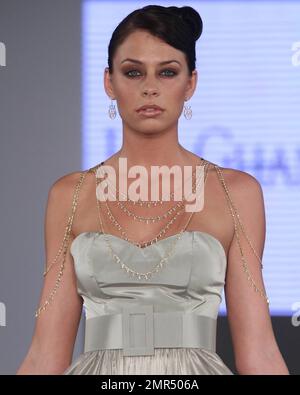 Beirut based Jad Ghandour and luxury house Danasha Luxury premiere a $1.5 million ultimate red-carpet gown featuring fine Belgium diamonds handset in 18 carat gold on day three of the12th Annual Miami International Fashion Week in Miami, FL.  03/20/10.   . Stock Photo
