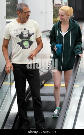 EXCLUSIVE!! 'The Fly' and 'Jurassic Park' star Jeff Goldblum, 58, and reported girlfriend, model and heiress Lydia Hearst-Shaw, 26, look very much the happy couple as they share some laughs while leaving a local gym. Hearst-Shaw, daughter of Patricia Hearst and Bernard Shaw, is set to appear in several films due out this year including 'Crimson Tear,' 'Two Jacks,' and 'Catwalk.' West Hollywood, CA. 4/20/11. Stock Photo