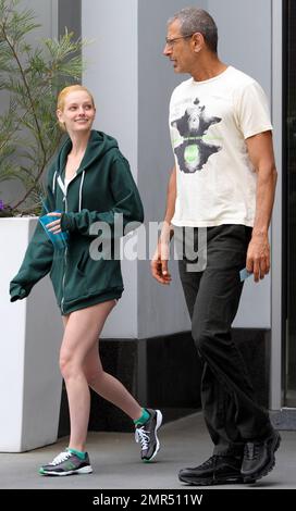 EXCLUSIVE!! 'The Fly' and 'Jurassic Park' star Jeff Goldblum, 58, and reported girlfriend, model and heiress Lydia Hearst-Shaw, 26, look very much the happy couple as they share some laughs while leaving a local gym. Hearst-Shaw, daughter of Patricia Hearst and Bernard Shaw, is set to appear in several films due out this year including 'Crimson Tear,' 'Two Jacks,' and 'Catwalk.' West Hollywood, CA. 4/20/11. Stock Photo