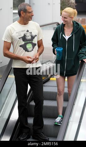 EXCLUSIVE!! 'The Fly' and 'Jurassic Park' star Jeff Goldblum, 58, and reported girlfriend, model and heiress Lydia Hearst-Shaw, 26, look very much the happy couple as they share some laughs while leaving a local gym. Hearst-Shaw, daughter of Patricia Hearst and Bernard Shaw, is set to appear in several films due out this year including 'Crimson Tear,' 'Two Jacks,' and 'Catwalk.' West Hollywood, CA. 4/20/11. Stock Photo