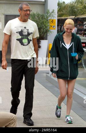 EXCLUSIVE!! 'The Fly' and 'Jurassic Park' star Jeff Goldblum, 58, and reported girlfriend, model and heiress Lydia Hearst-Shaw, 26, look very much the happy couple as they share some laughs while leaving a local gym. Hearst-Shaw, daughter of Patricia Hearst and Bernard Shaw, is set to appear in several films due out this year including 'Crimson Tear,' 'Two Jacks,' and 'Catwalk.' West Hollywood, CA. 4/20/11. Stock Photo