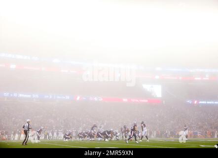 New England Patriots quarterback Tom Brady greets members of the U.S.  military along the sideline before an NFL football game against the Atlanta  Falcons, Sunday, Oct. 22, 2017, in Foxborough, Mass. (AP