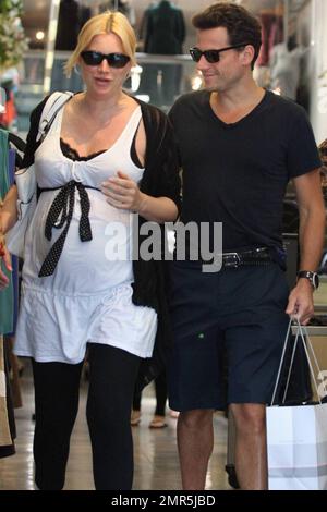 - Ioan Gruffudd and his pregnant wife Alice Evans spend the day shopping and kissing in Beverly Hills, Ca. 8/10/09    . Stock Photo