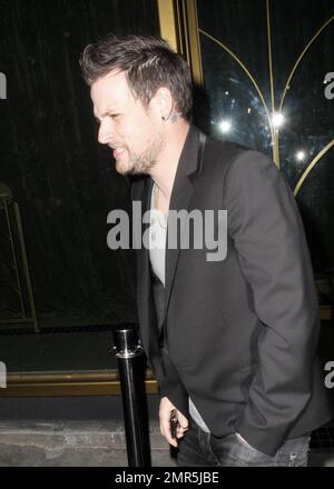The newly single Benji Madden looks like he may not be in a great mood as he leaves the opening of the new nightclub Delux Hollywood. His ex, Paris Hilton also attended the event. Los Angeles, CA. 12/4/08. Stock Photo