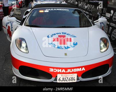 Cars on display at the 11th annual Gumball 3000 rally race, which kicks off in London and will see participants race through the streets of Amsterdam, Copenhagen, Stockholm, Boston, Quebec City, Toronto and New York City.  The good spirited race prides itself on not keeping timing scores and acts more as a showcase for high-end sports cars an novelty automobiles. London, UK. 05/01/10. Stock Photo