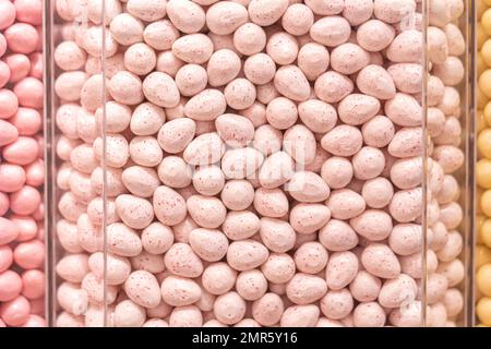 Pastel pink candies in a shop window Stock Photo