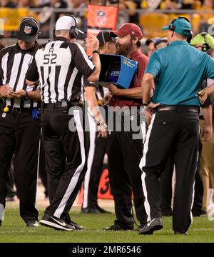 Referee Bill Vinovich (52) looks toward the Kansas City Chiefs bench during  an NFL football game against the Tampa Bay Buccaneers, Sunday, Oct. 2, 2022  in Tampa, Fla. The Chiefs defeat the