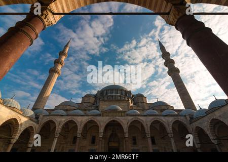 Suleymaniye Mosque wide angle view from courtyard with cloudy sky. Mosques of Istanbul. High quality photo. Istanbul Turkiye - 12.23.2022 Stock Photo