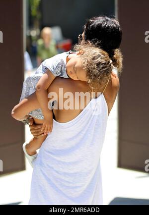 Halle Berry's daughter Nahla sleeps soundly on her mom's shoulder as