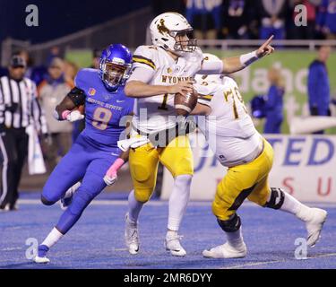 Boise State defensive end Jabril Frazier (8) hits Wyoming quarterback Josh  Allen (17) as he releases the football for an incomplete pass during an  NCAA college football game Saturday, Oct. 21, 2017