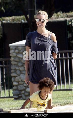 A dressed down Heidi Klum sports some banged up knees as she spends the day in a Beverly Hills park with her children Helene 'Leni' Klum, 4, Henry Gunther Samuel, 3, and Johan Samuel, 1. Johan will celebrate his 2nd birthday on November 22. Los Angeles, CA. 10/18/08. Stock Photo