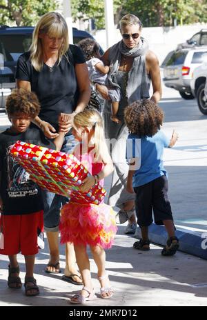 Heidi Klum, husband Seal and their children Leni, Henry, Johan and Lou arrive bearing gifts at the birthday party for David and Victoria Beckham's son Romeo, who turned 8 years old today. Los Angeles, CA. 9/1/10. Stock Photo