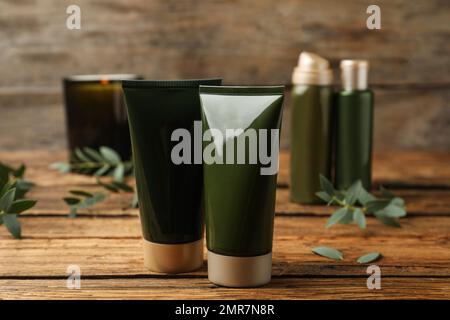 Different cosmetic products on wooden table, closeup Stock Photo