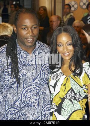 Lennox Lewis and wife Violet Chang at the screening of 'Hereafter' at the Toronto International Film Festival. Toronto, ON. 9/12/10. Stock Photo