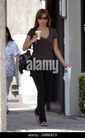 EXCLUSIVE!! Australian actress and pop star Holly Valance was seen out and about in Los Angeles this morning. The 26-year-old singer and 'Neighbours' pin-up was seen visiting a medical center in Beverly Hills and left the center with what appeared to be a cup of coffee and prescription medicine. Valance, who wasn't sporting any rings on her fingers, appeared to be happy and fit. It's reported that Valance just released a new CD called 'Superstar' and is set to star in the upcoming film 'Luster.'  Los Angeles, CA.  7/29/09. Stock Photo