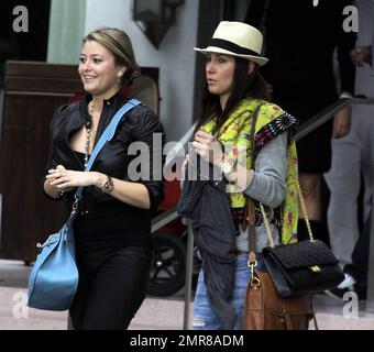 EXCLUSIVE!! Model turned actress, Holly Valance, leaves South Beach after checking out of her luxury hotel where she had been staying with her boyfriend Nick Candy and friends. Valance, best known for her bikini figure, was in good spirits and enjoyed a leisurely lunch before leaving town and saying her farewells. Miami Beach, FL. 12/29/10 Stock Photo