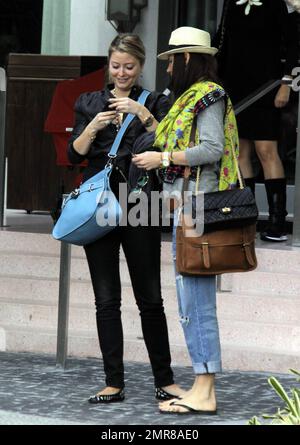 EXCLUSIVE!! Model turned actress, Holly Valance, leaves South Beach after checking out of her luxury hotel where she had been staying with her boyfriend Nick Candy and friends. Valance, best known for her bikini figure, was in good spirits and enjoyed a leisurely lunch before leaving town and saying her farewells. Miami Beach, FL. 12/29/10 Stock Photo