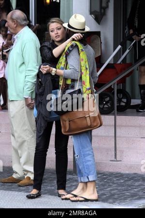 EXCLUSIVE!! Model turned actress, Holly Valance, leaves South Beach after checking out of her luxury hotel where she had been staying with her boyfriend Nick Candy and friends. Valance, best known for her bikini figure, was in good spirits and enjoyed a leisurely lunch before leaving town and saying her farewells. Miami Beach, FL. 12/29/10 Stock Photo