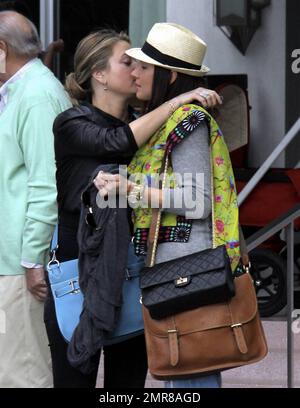 EXCLUSIVE!! Model turned actress, Holly Valance, leaves South Beach after checking out of her luxury hotel where she had been staying with her boyfriend Nick Candy and friends. Valance, best known for her bikini figure, was in good spirits and enjoyed a leisurely lunch before leaving town and saying her farewells. Miami Beach, FL. 12/29/10 Stock Photo