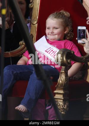 Honey Boo Boo (aka Alana Thompson), star of the TLC reality show 'Here Comes Honey Boo Boo,' and her mother June Shannon make an appearance at The Grove shopping center for an interview with Jerry Penacoli. During the interview, the child beauty pageant star wore a sash that read 'Little Miss Extra.' Los Angeles, CA. 15th October 2012. Stock Photo