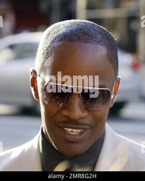 Jamie Foxx greets fans and shows off his head tattoo at the premiere of  Horrible Bosses at the Grauman Chinese Theatre Los Angeles CA 06302011  Stock Photo  Alamy