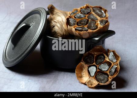Black fermented garlic (Allium sativum) Stock Photo