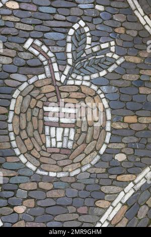 Apple and drinking cup as pavement mosaic on the pavement, Freiburg im Breisgau, Baden-Württemberg, Germany, Europe Stock Photo