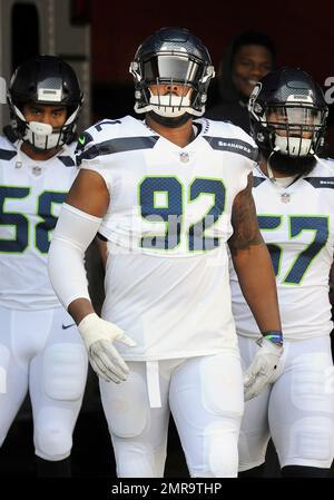 Seattle Seahawks tackle (92) Nazair Jones heads for the field for