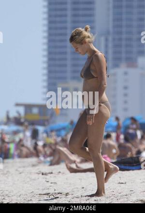 Exclusive!! Is Danish fashion model Camilla Vest pregnant? The model was patting and rubbing her belly. Her stomach appeared to be more rounded than usual. Miami Beach, FL. 4/24/09. Stock Photo