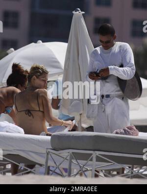 Exclusive!! Is Danish fashion model Camilla Vest pregnant? The model was patting and rubbing her belly. Her stomach appeared to be more rounded than usual. Miami Beach, FL. 4/24/09. Stock Photo