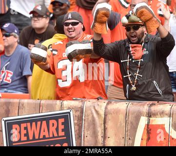 Fans in the Dawg Pound at Cleveland Browns Stadium whoop it up during the  Browns' 51-45 win over the Cincinnati Bengals in an NFL football game  Sunday, Sept. 16, 2007, in Cleveland. (