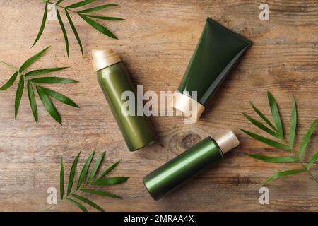 Flat lay composition with cosmetic products on wooden table Stock Photo