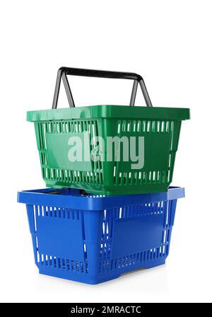 Color plastic shopping baskets isolated on white Stock Photo