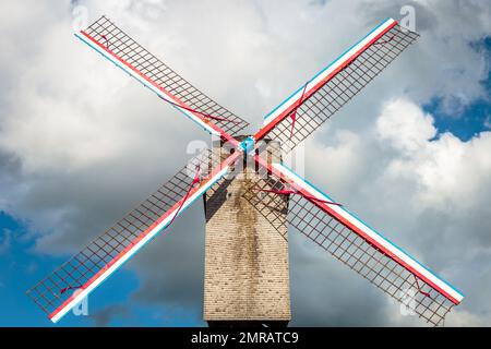 Rustic wooden windmill in idyllic Bruges public park, Belgium Stock Photo