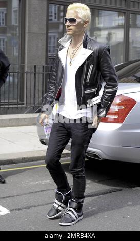 Actor and 30 Seconds to Mars lead singer Jared Leto arrives to BBC Radio 1 for an interview and disappoints fans by not signing any autographs.  The bleach blonde, leather jacket and high-top sneaker clad rocker later left the studio.  30 Seconds to Mars is currently in the middle of a world tour. London, UK. 07/08/10.   . Stock Photo