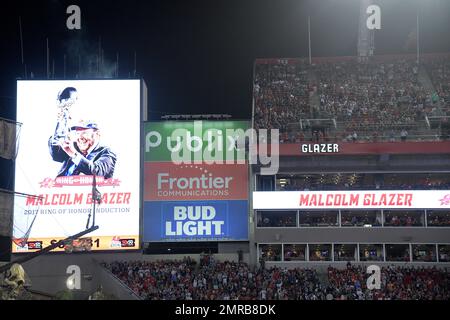 https://l450v.alamy.com/450v/2mrb8dk/former-tampa-bay-buccaneers-owner-malcolm-glazer-is-shown-on-a-video-monitor-as-his-name-is-inducted-into-the-teams-ring-of-honor-at-raymond-james-stadium-during-halftime-of-an-nfl-football-game-against-the-new-england-patriots-thursday-oct-5-2017-in-tampa-fla-ap-photophelan-m-ebenhack-2mrb8dk.jpg