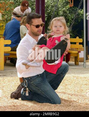 Actor/Director Jason Priestley was seen attending the 'Pregnancy Awareness Month' event in Santa Monica with his wife Naomi and 22 month old daughter Ava.  The event was held at the Little Dolphins By The Sea Preschool.  Jason and Ava spent most of their time playing at the playground.  Los Angeles, CA.  5/2/09. Stock Photo