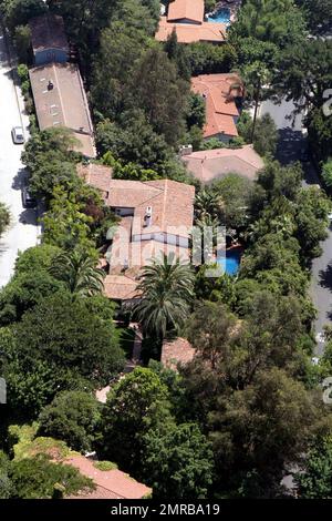 https://l450v.alamy.com/450v/2mrba19/exclusive!!-aerial-views-of-the-home-jason-statham-has-reportedly-purchased-for-11495-million-from-actor-ben-stiller-and-christine-taylor-the-10-bedroom-11-bathrom-estate-features-two-separate-homes-one-spanish-and-one-mediterranean-style-in-addition-to-a-one-bedroom-guest-house-magnificent-pool-outdoor-living-and-dining-areas-and-a-beautiful-grassy-yard-built-in-1929-the-sunset-strip-home-also-includes-a-detached-garage-and-carport-maids-quarters-a-gym-library-guest-room-den-and-bonus-room-and-inside-a-gated-neighborhood-los-angeles-ca-8th-august-2011-2mrba19.jpg